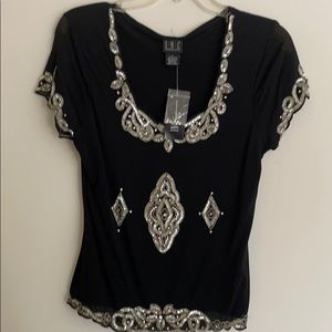 Sparkly black white top